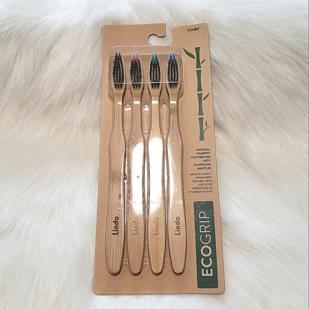 Natural Bamboo toothbrush with charcoal brushes.